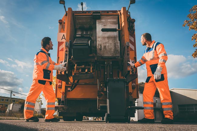 Waste refuse workers with waste truck